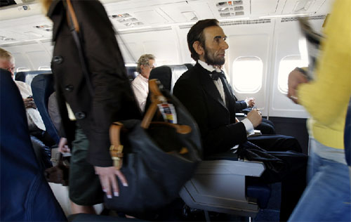 Honest Abe Flies Coach