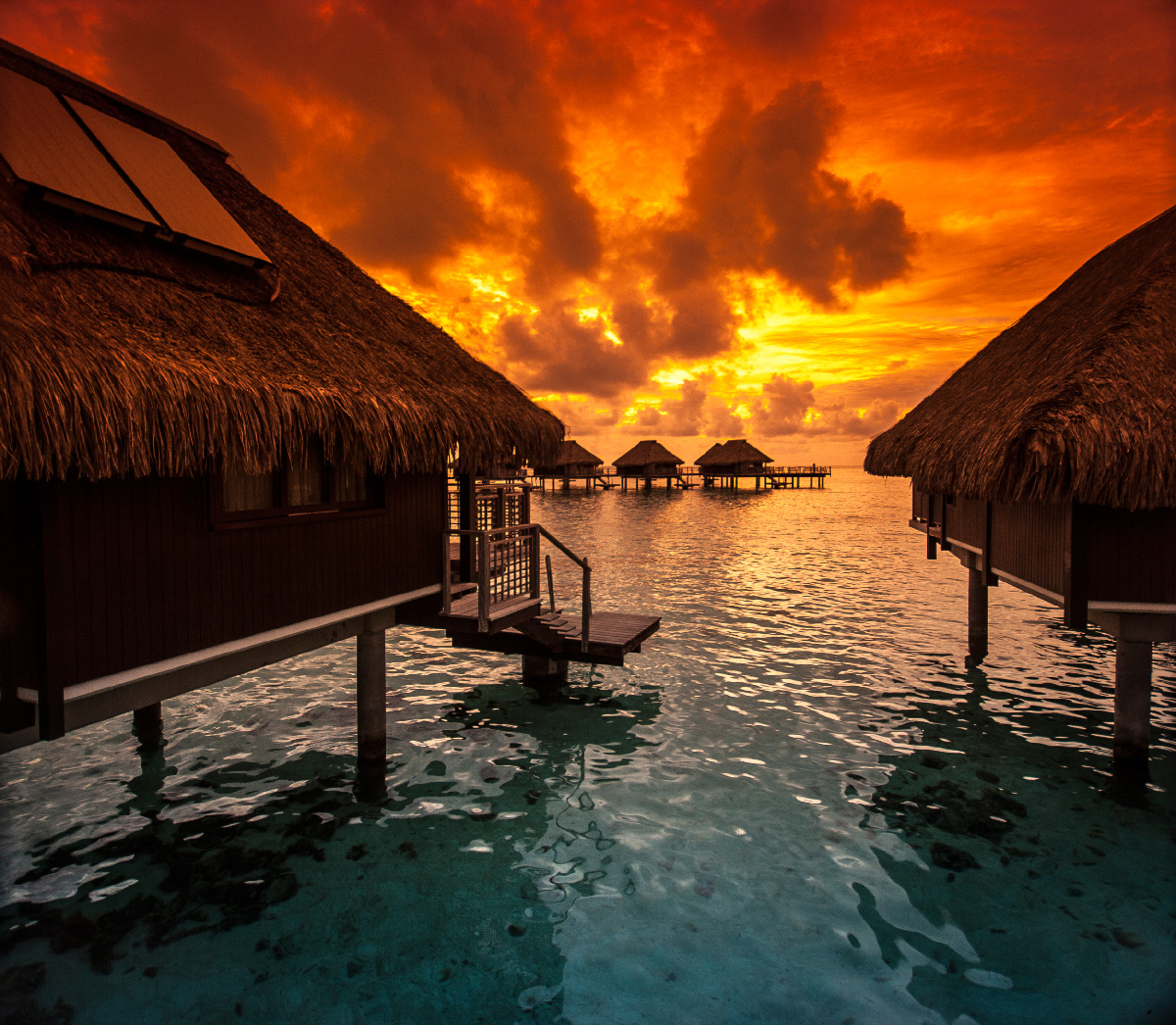 Brilliant sun display from Hilton Moorea, Tahiti