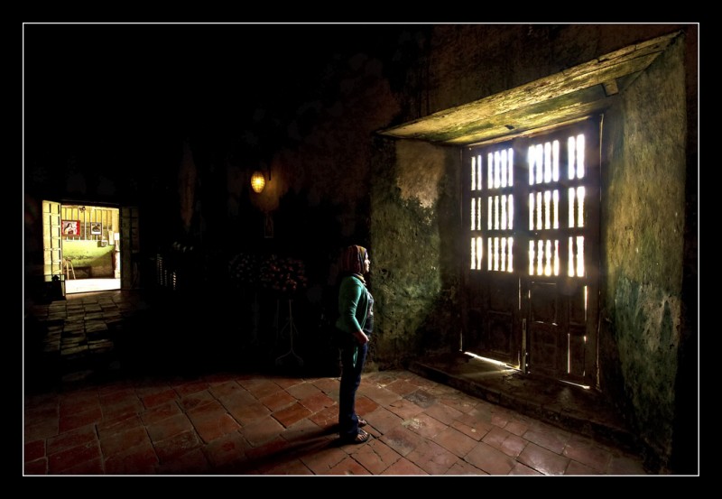 Woman standing Inside Baclayon Church, Philippines