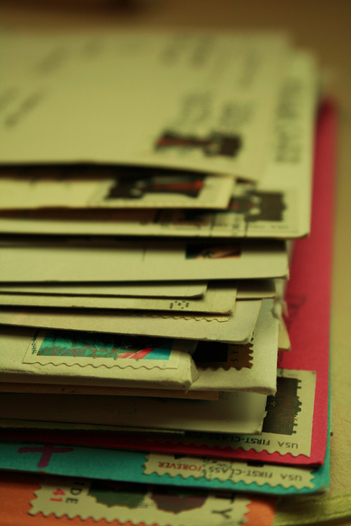Stack of Letters from Friends / Stamped envelopes