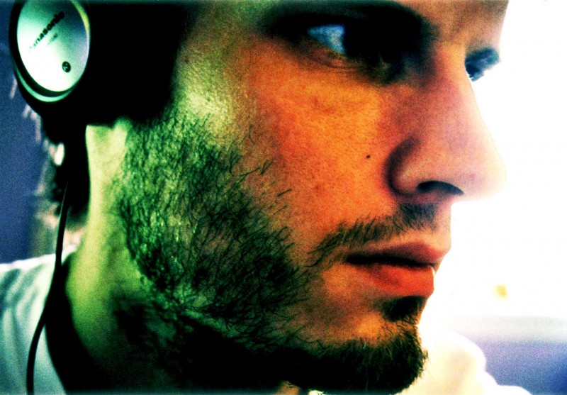 Man Listening to Headphones, Scotland Man Listening to Headphones, Scotland (closeup)