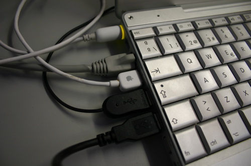 Closeup of Powerbook laptop with cables