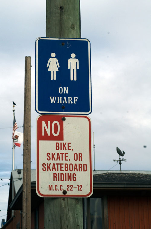 Confusing sign on Fisherman\'s Wharf in Monterey, California
