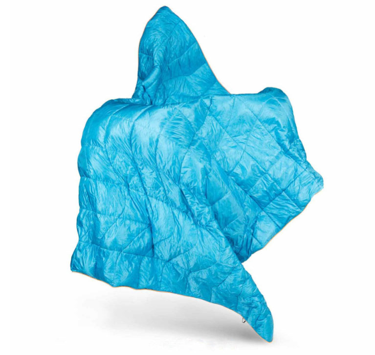 Rumpl's Down Puffy Blanket Is Like Bringing Your Own Luxury Bedding on