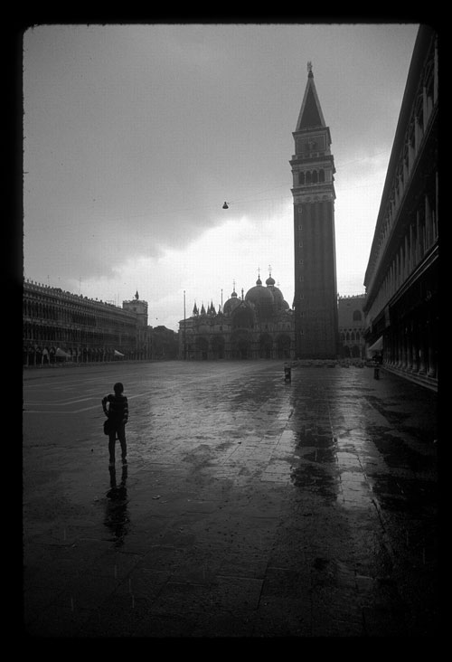 Sole traveler in San Marco during deluge