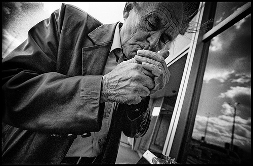 Old man smoking in Moscow, Russia