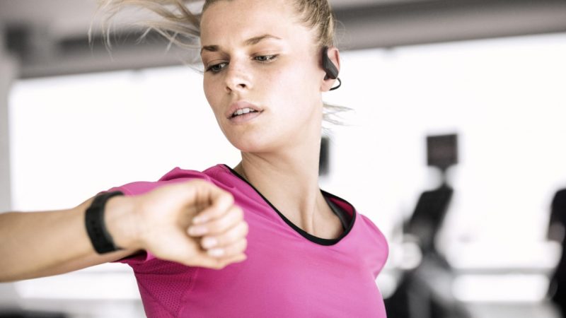 Girl working out with TomTom Spark 3 fitness tracker