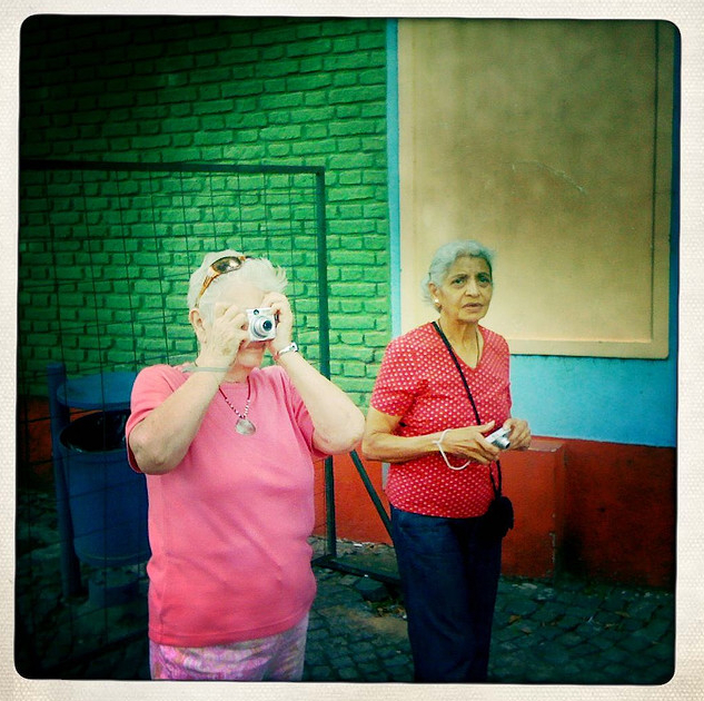 Two Ladies Taking iPhone Photos