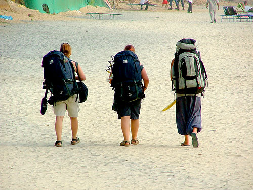 Vagabonds, Indian Beach Three backpackers on beach in India