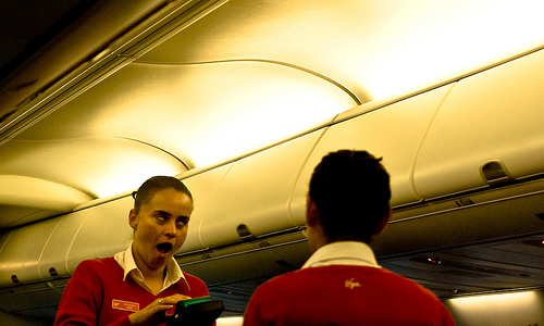 Zombie Flight Attendant Funny capture of flight attendant making zombie-like face